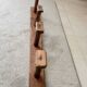 Old wall-mounted coat rack from a stable, folk art.