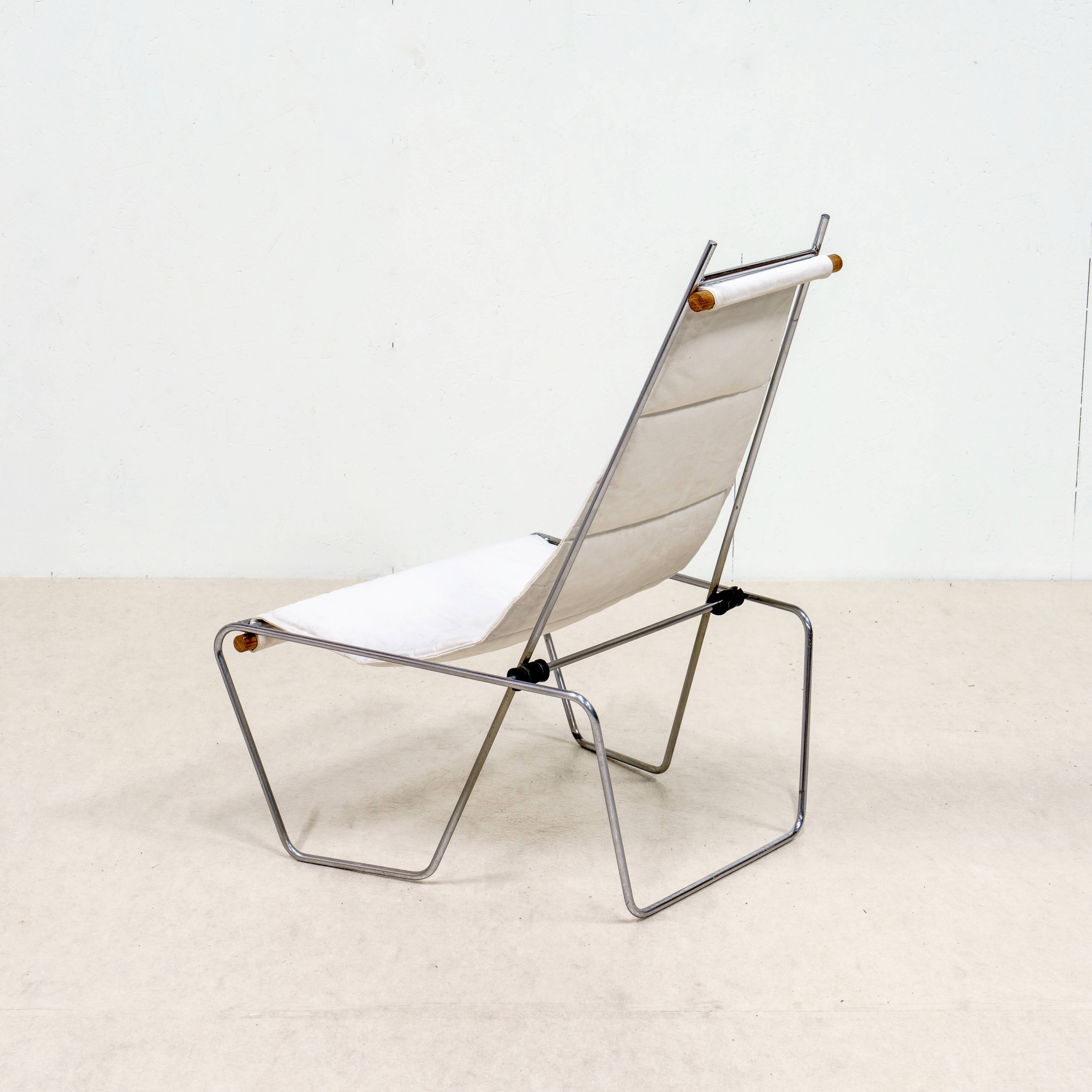 A pair of low chairs. France 70s