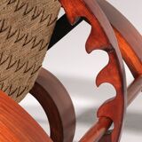 An exceptionally rare mahogany recliner crafted in Italy during the 1950s"