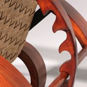 An exceptionally rare mahogany recliner crafted in Italy during the 1950s"