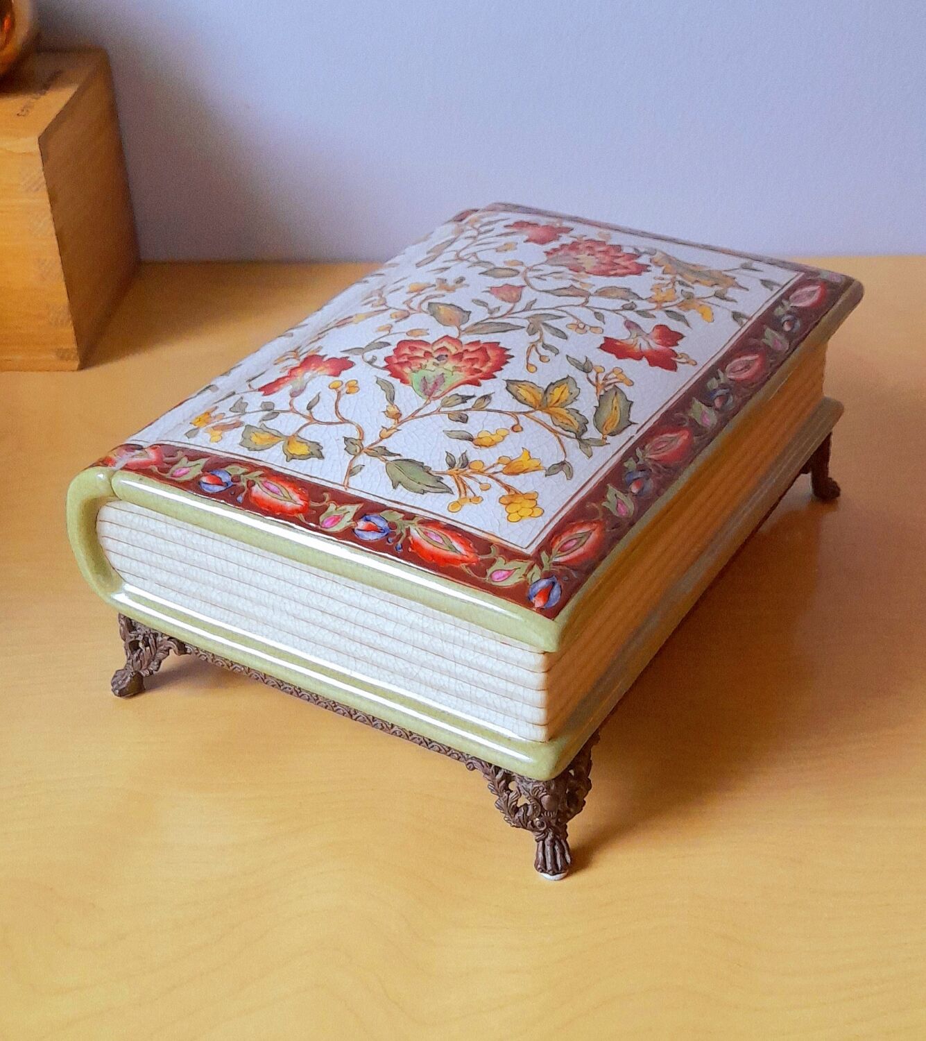 Porcelain box on claw feet