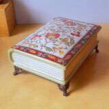 Porcelain box on claw feet