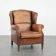 Charming sheepskin leather wingback chair with warm colours