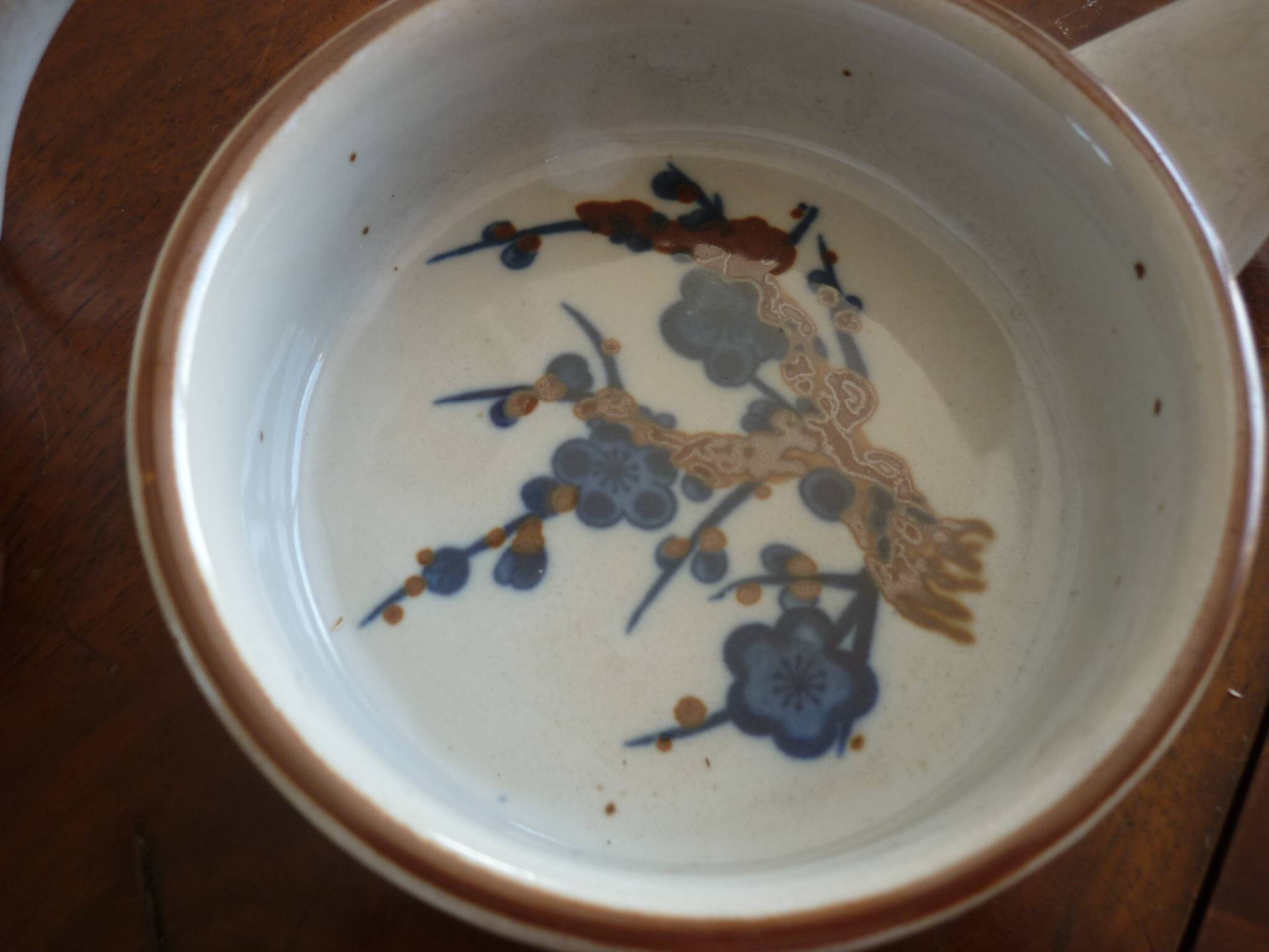 3 ceramic casserole dishes with blue and brown branch pattern