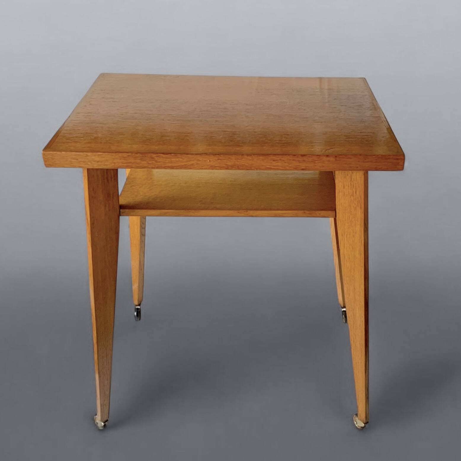 Varnished wooden trolley on wheels