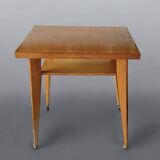 Varnished wooden trolley on wheels