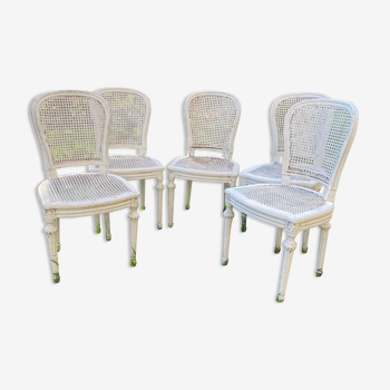 Bleached patinated canned chairs