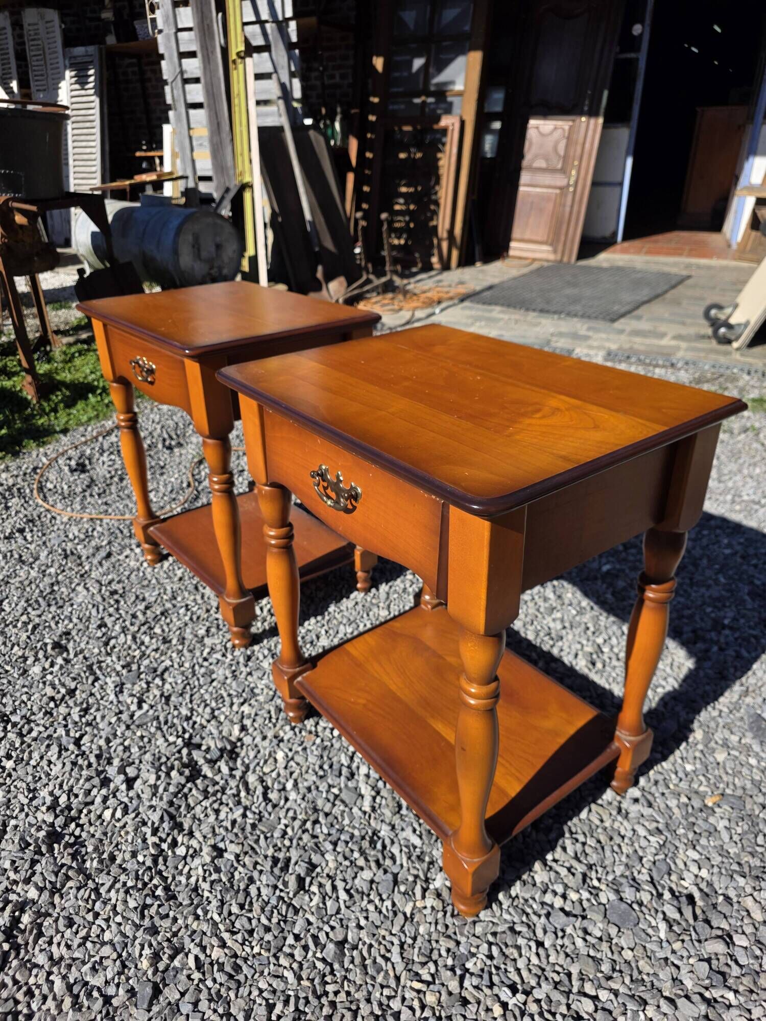 Pair of cherry wood bedside tables from the mid-20th century.