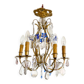 Antique French cage chandelier in gilded bronze and crystal, with blue pendants.