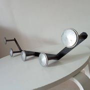 Vintage 1950s wall coat rack, wrought iron with chiselled details and solid aluminium.