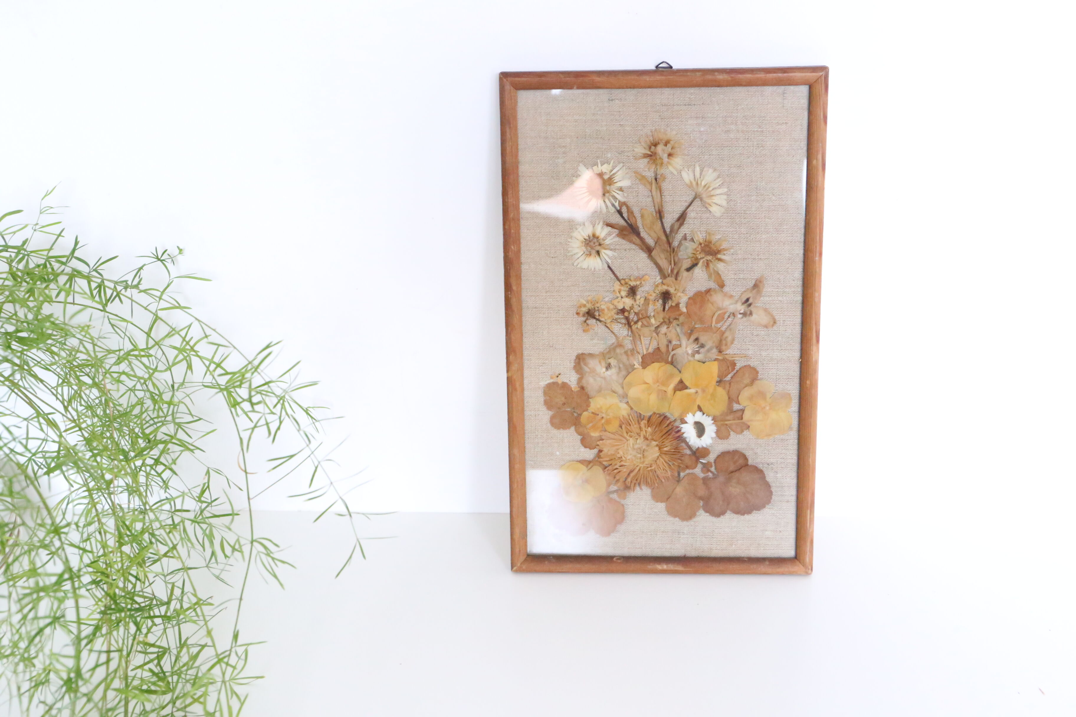 Nice table of dried flowers on beige linen