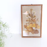 Nice table of dried flowers on beige linen