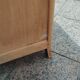 Vintage commode with tapered legs.