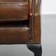 Fauteuil Chesterfield en cuir de vache marron de style anglais