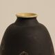 Ceramic vase decorated with women and a tree.