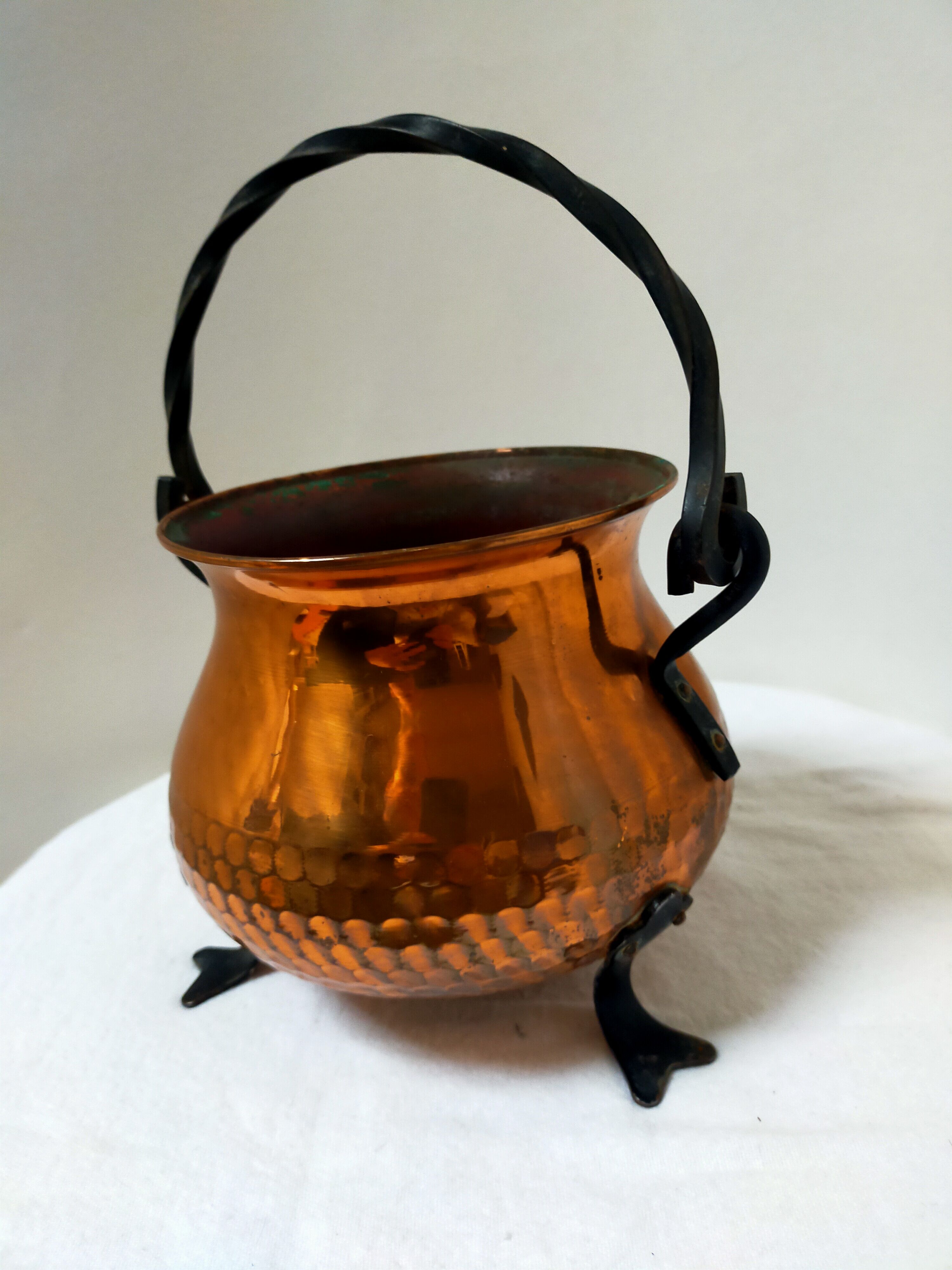Copper cauldron on feet
