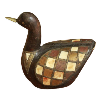 Wooden duck brass bone