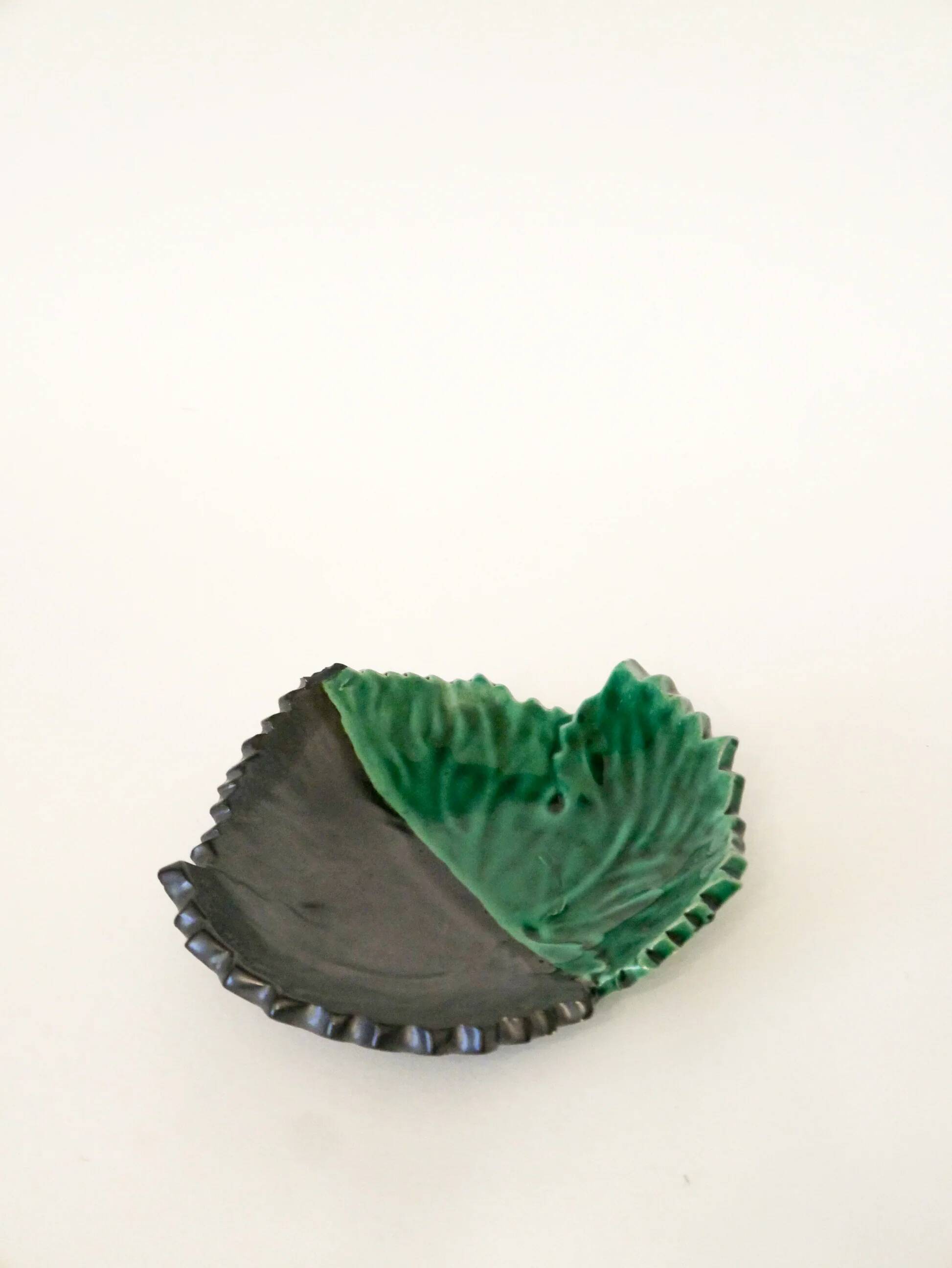 Two-tone ceramic leaf dish, green and black, signed, 1960.