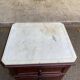 Vintage walnut and marble chest of drawers from 1920.