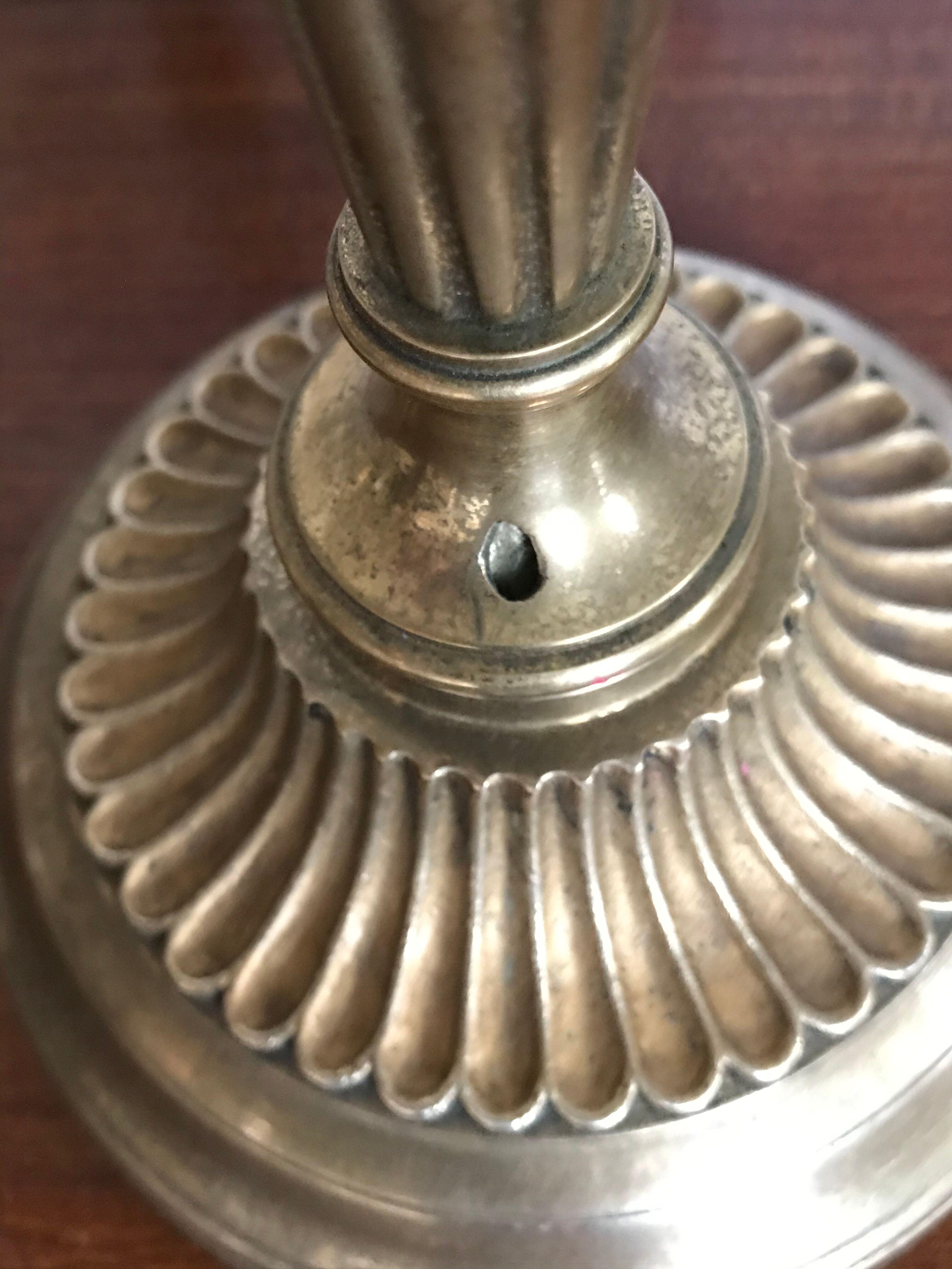 Pair of golden brass candlesticks