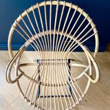 Paire de fauteuils corbeille en rotin - vers 1960.