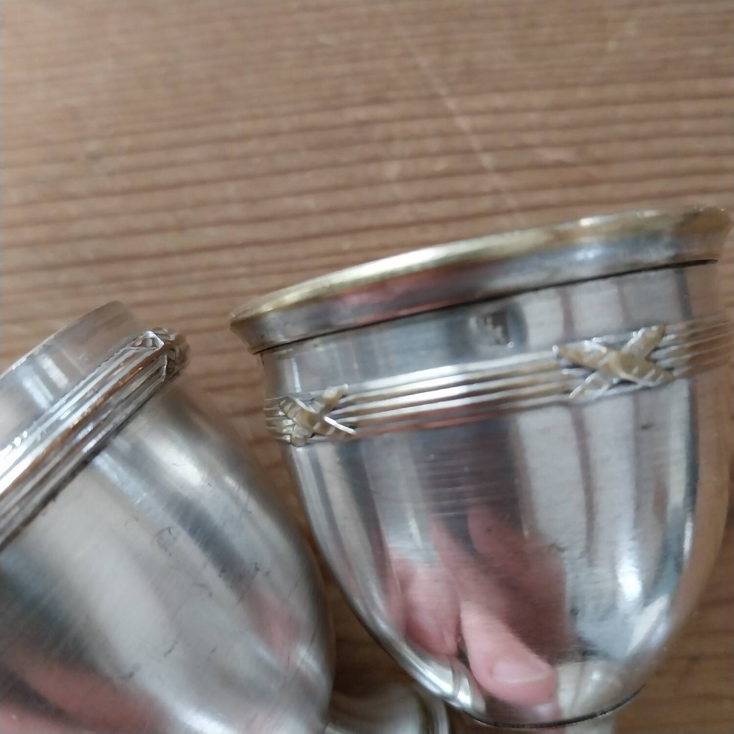 Antique egg cups on silver-plated metal stand