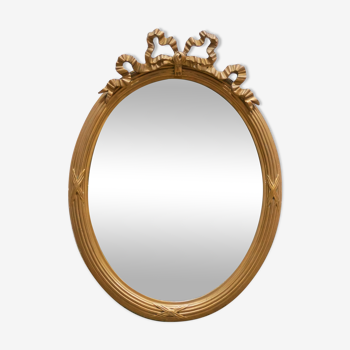 Old oval mirror louis xvi style in gilded wood 63cm x 47cm