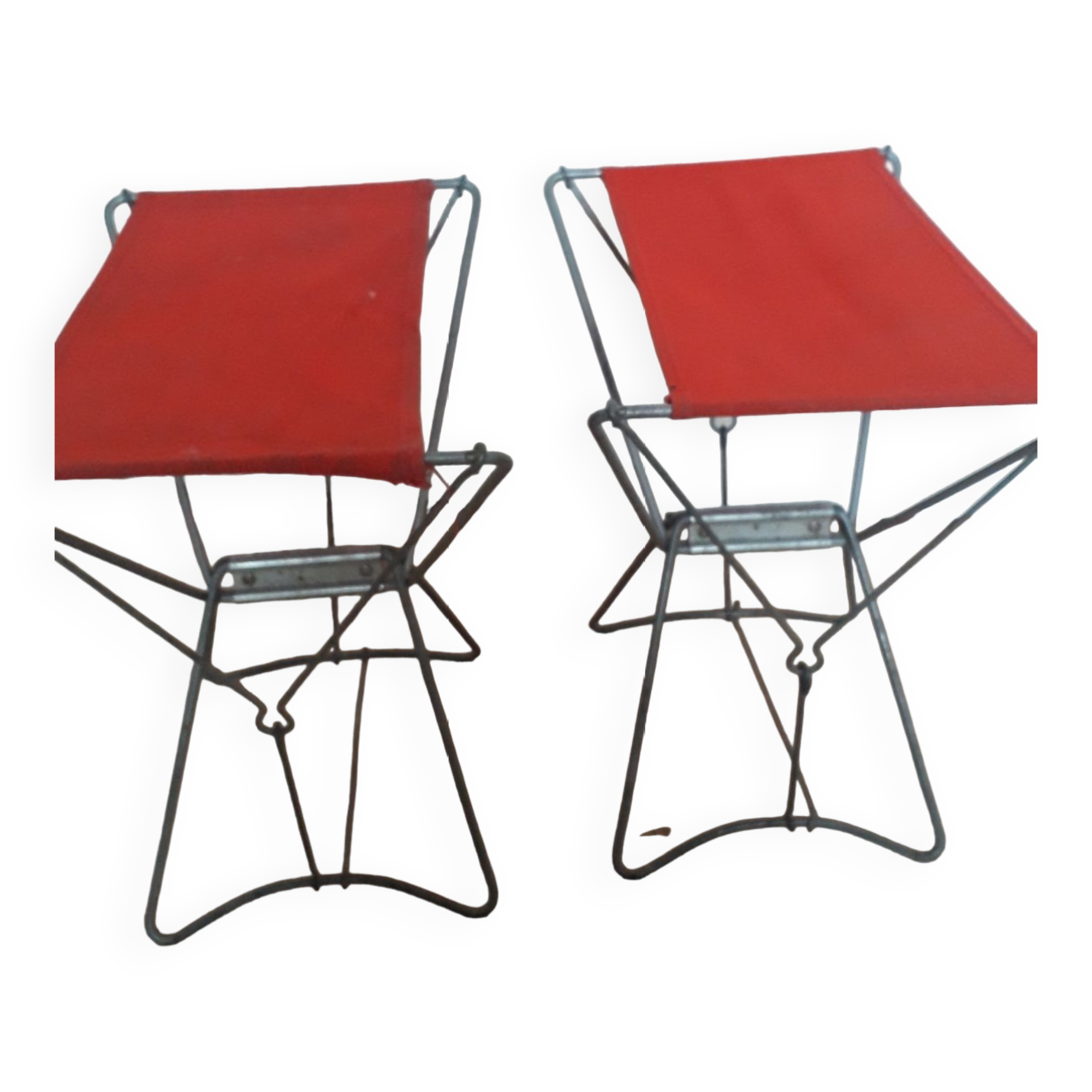 Folding stool in red canvas but unstitched on one side