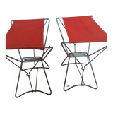 Folding stool in red canvas but unstitched on one side