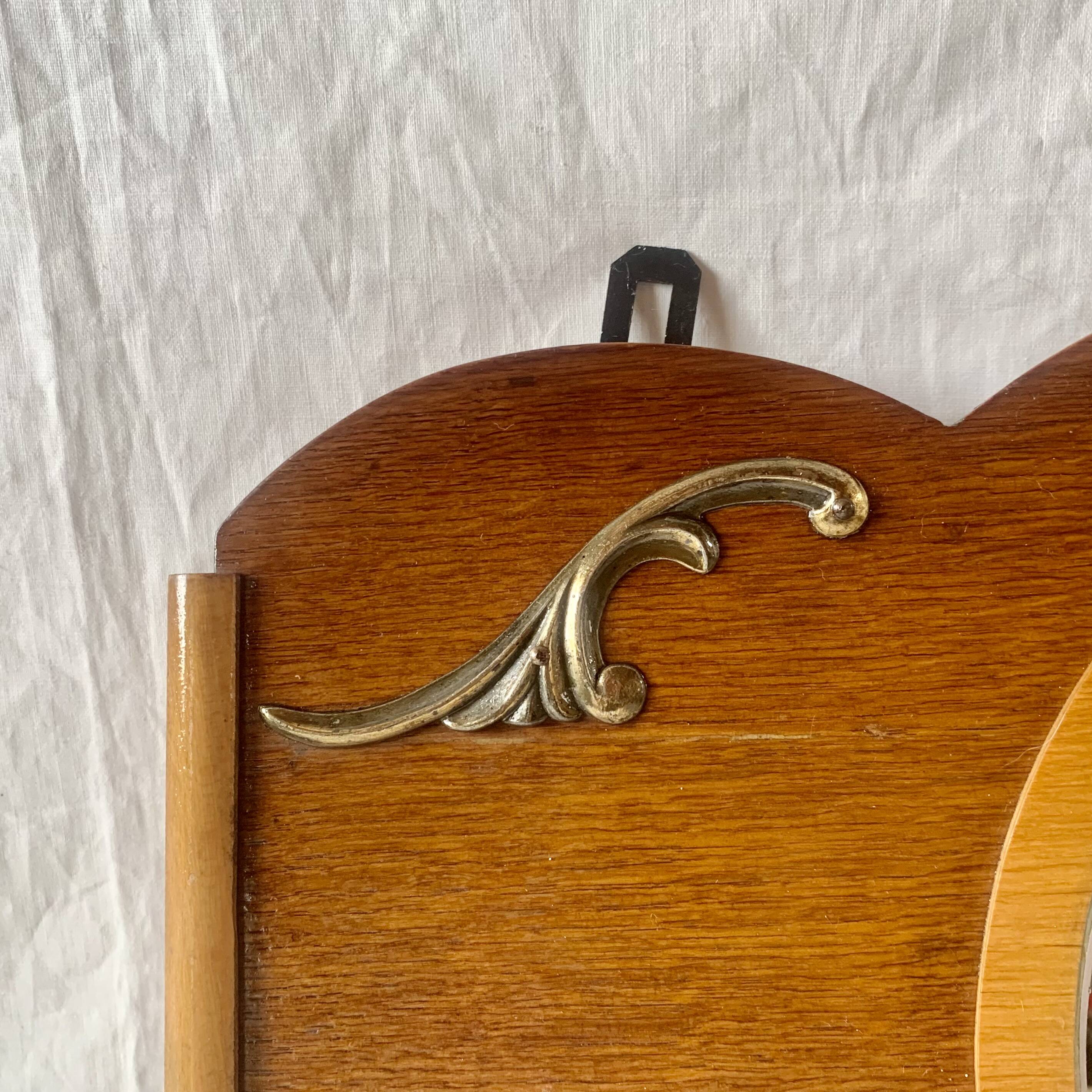 Art Deco wooden wall coat rack with round central mirror