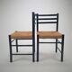 Set of 2 black and straw modernist side chairs, 1960s