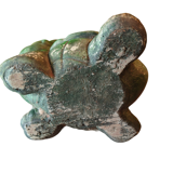 Green turtle in concrete