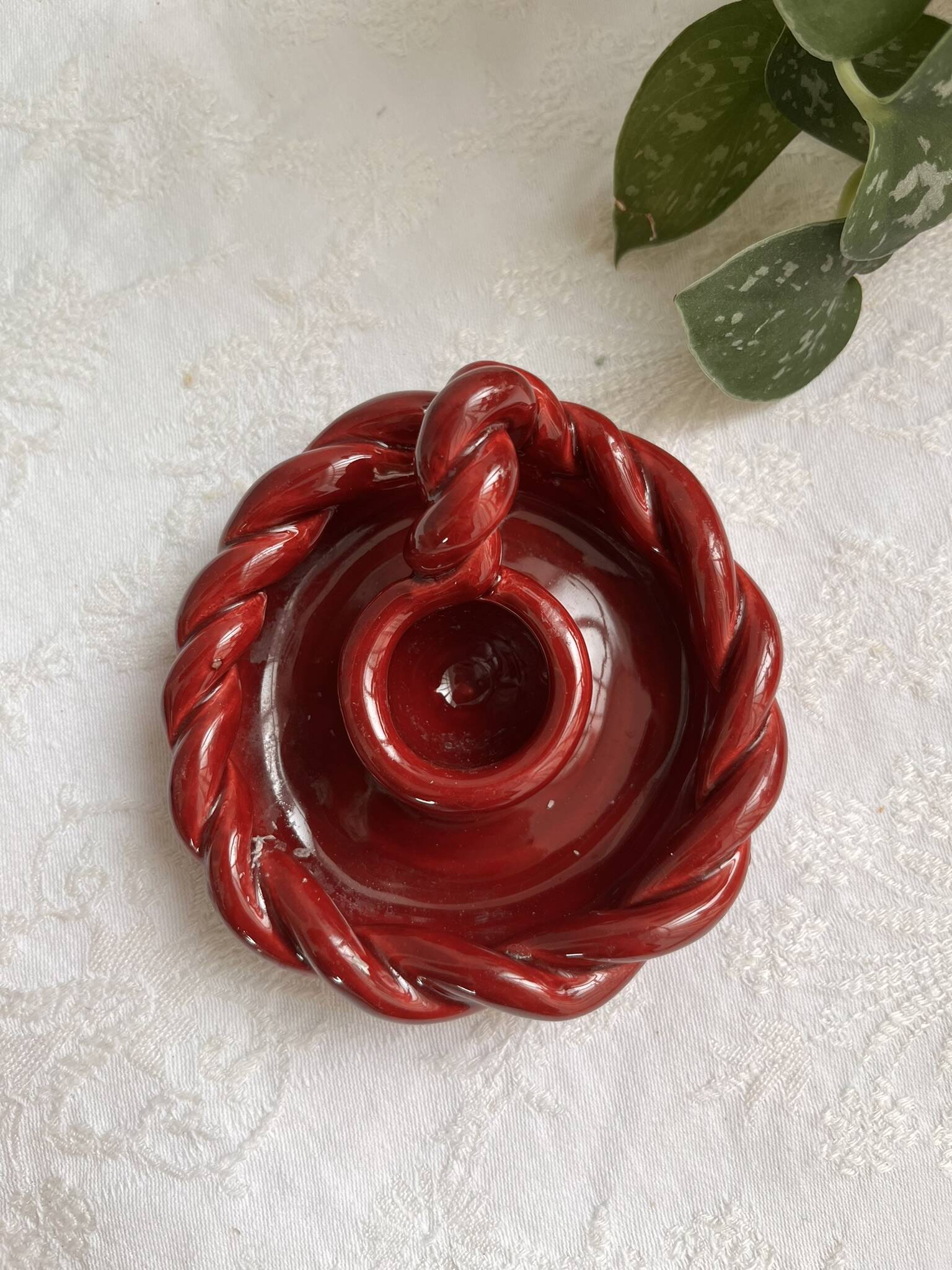 Twisted red earthenware candle holder - in the style of St Clément