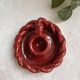 Twisted red earthenware candle holder - in the style of St Clément