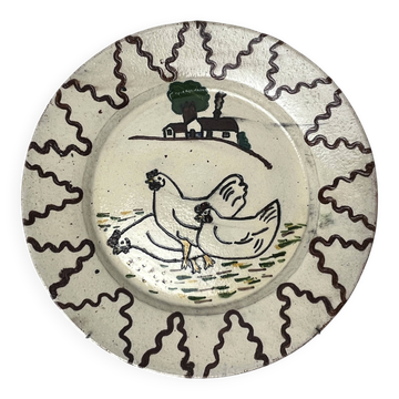 Old terracotta plate decorated with chickens, Portugal, 20th century.