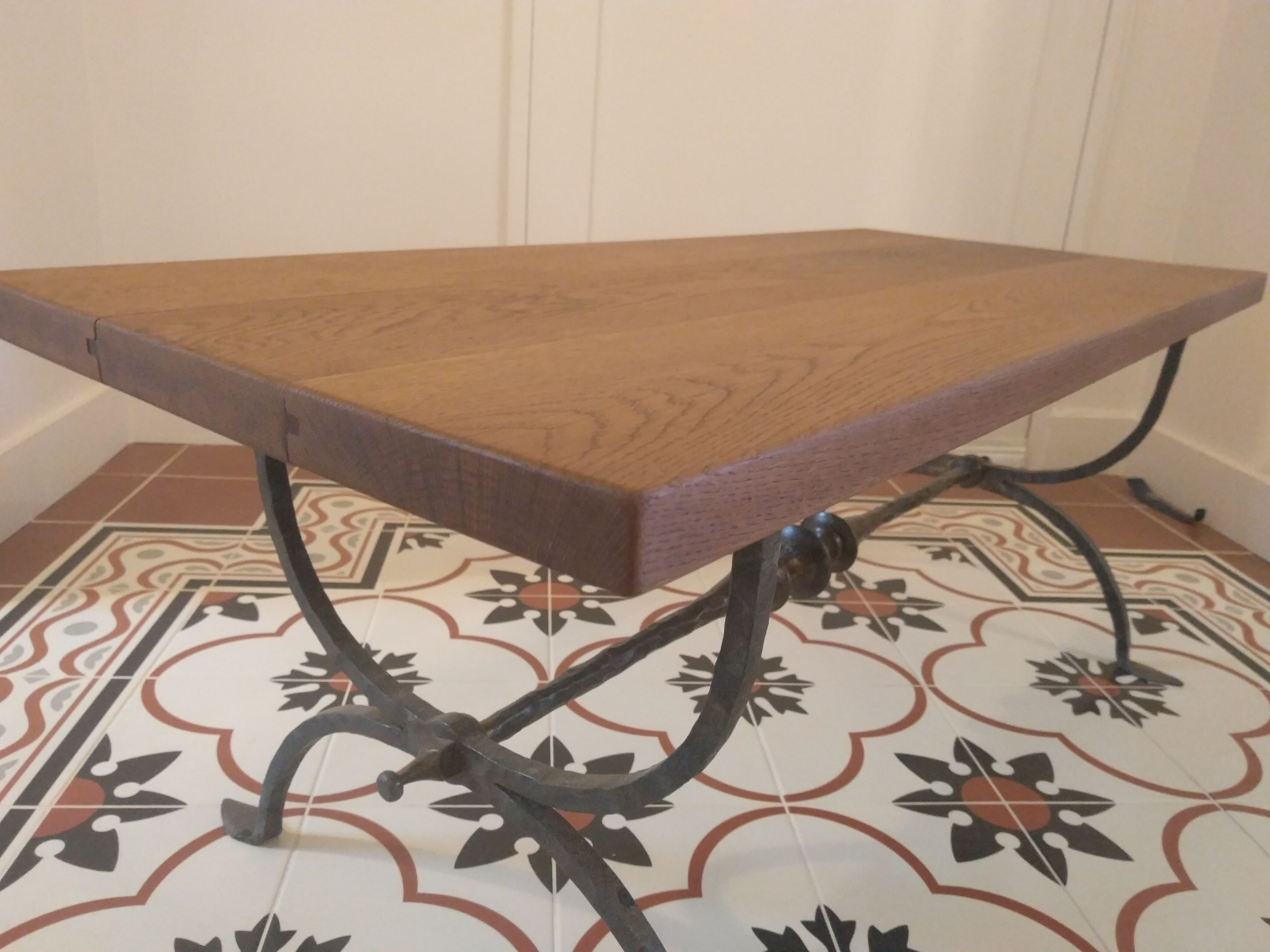 Coffee table, wooden top, wrought iron legs
