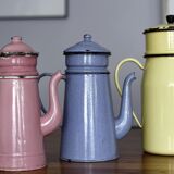 Set of old coffee makers in enamelled sheet metal
