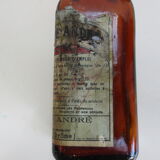 2 amber glass bottles with their old labels