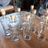 Set of 8 glass bottles with corks