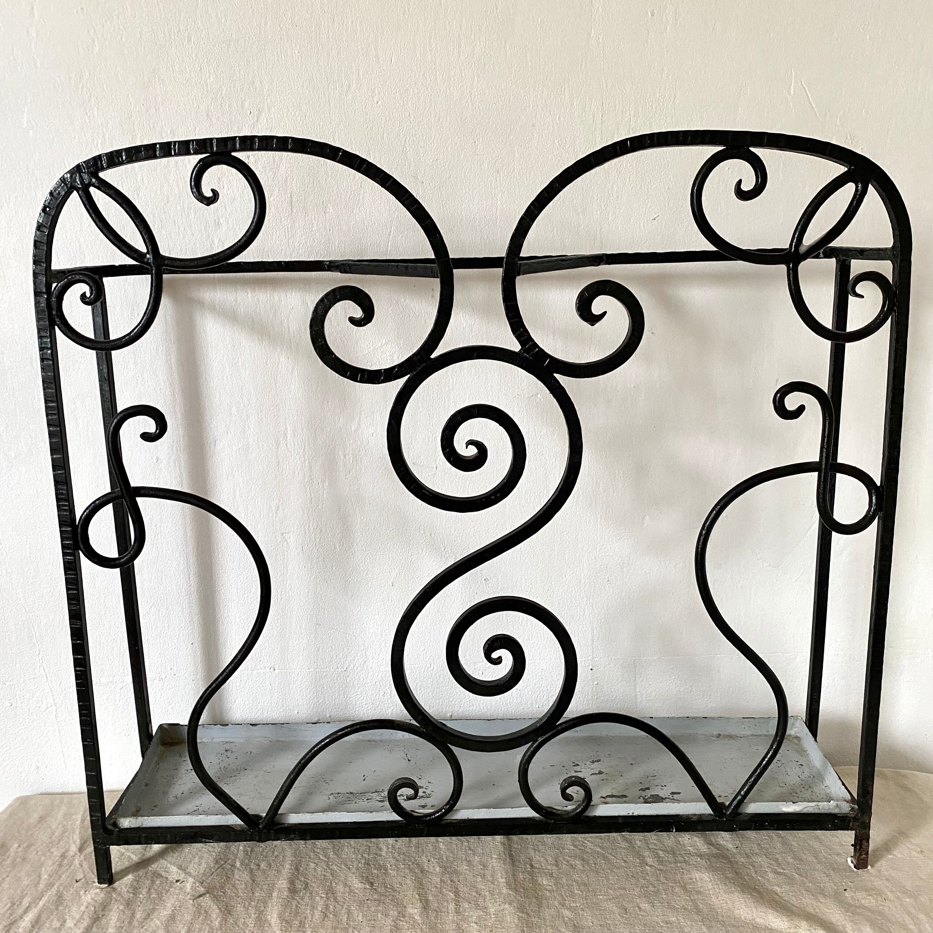 Porte parapluie en fer forgé