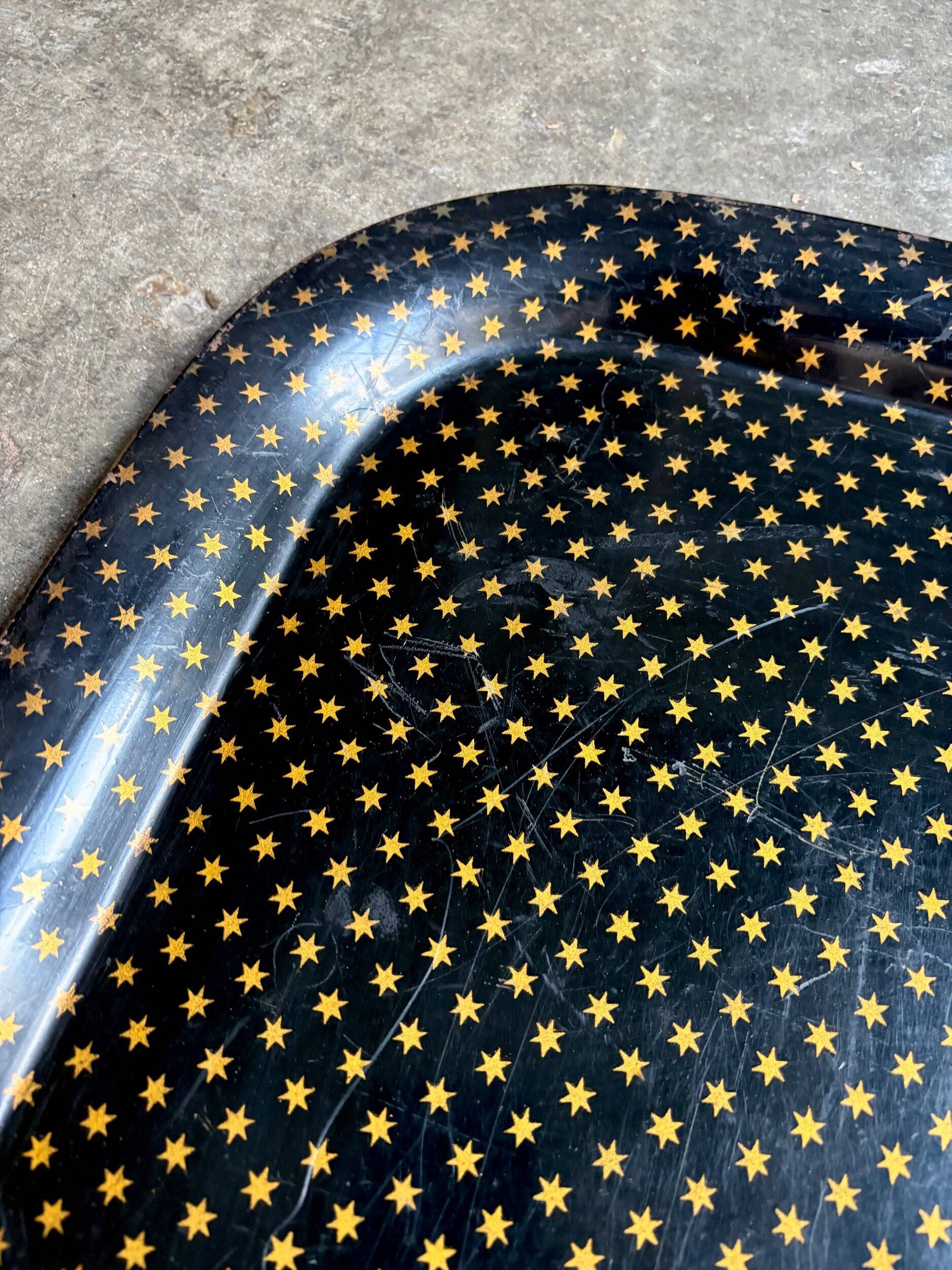 Napoleon III tray in black enamelled sheet metal with gold stars