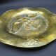 Bronze plate decorated with an eagle
