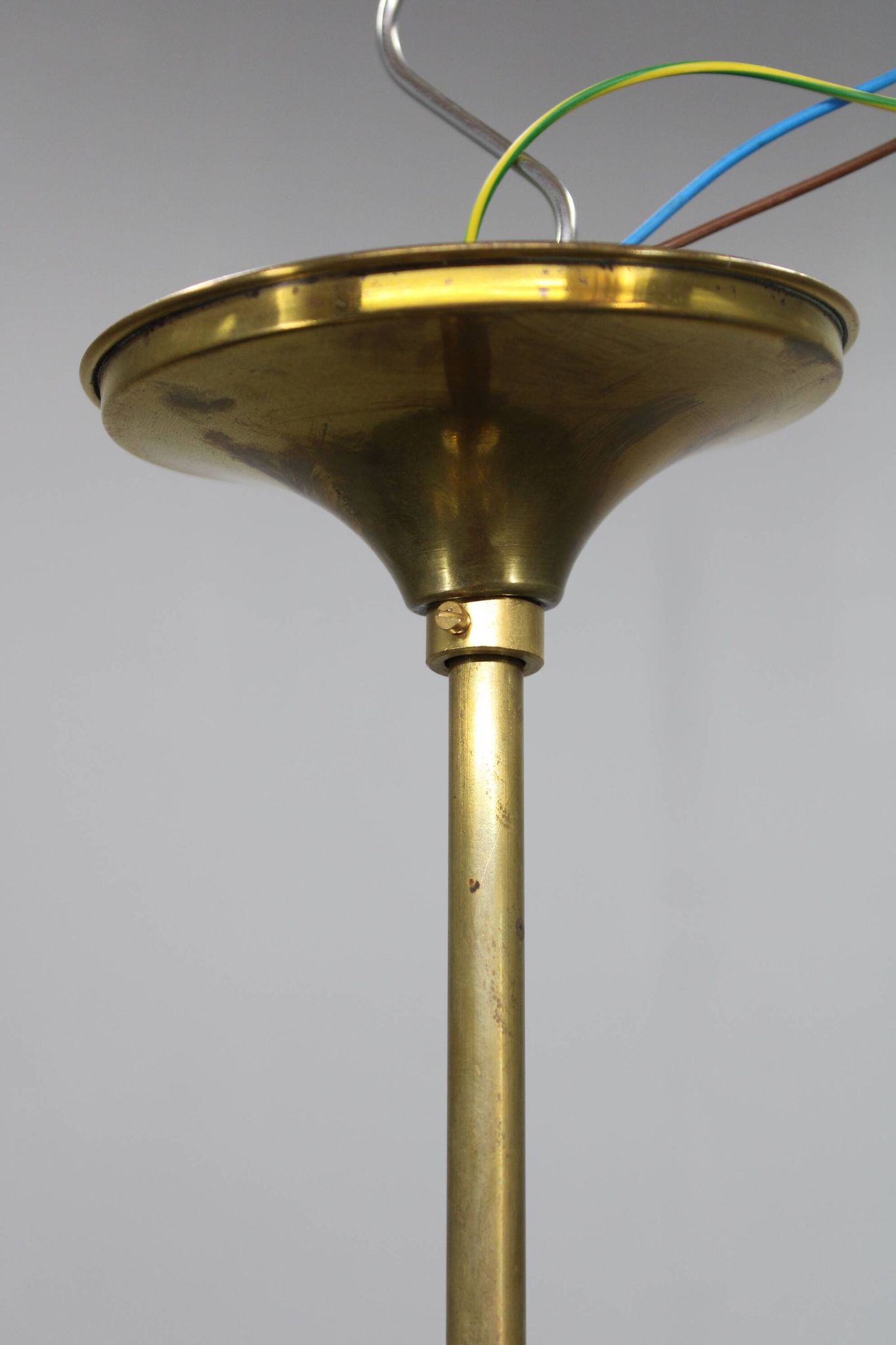 1930s Czechoslovak Art Deco brass chandelier with four opaline glass globes