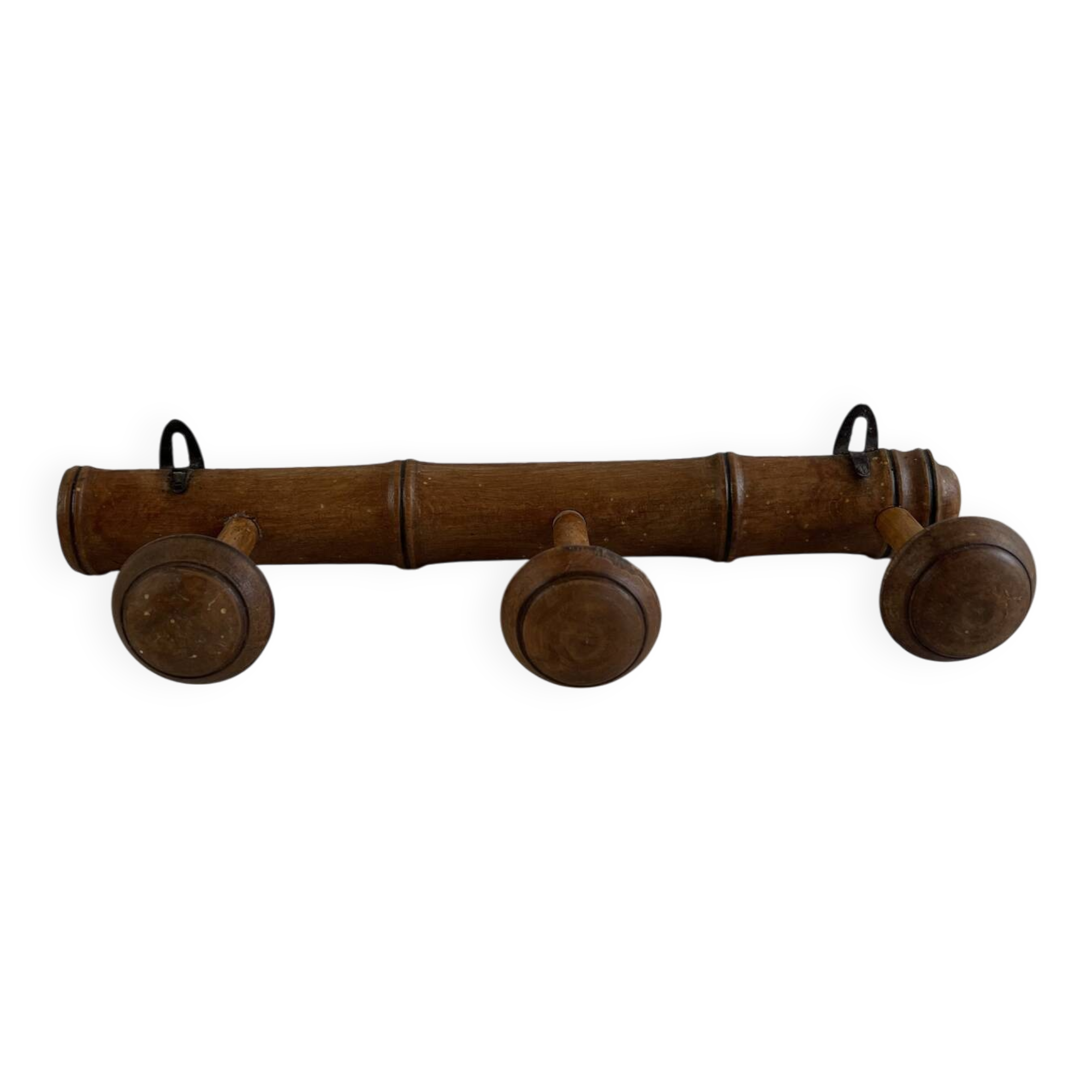 Wooden coat rack with three ball hooks.