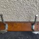 Wall coat rack two old metal hooks on vintage varnished wood
