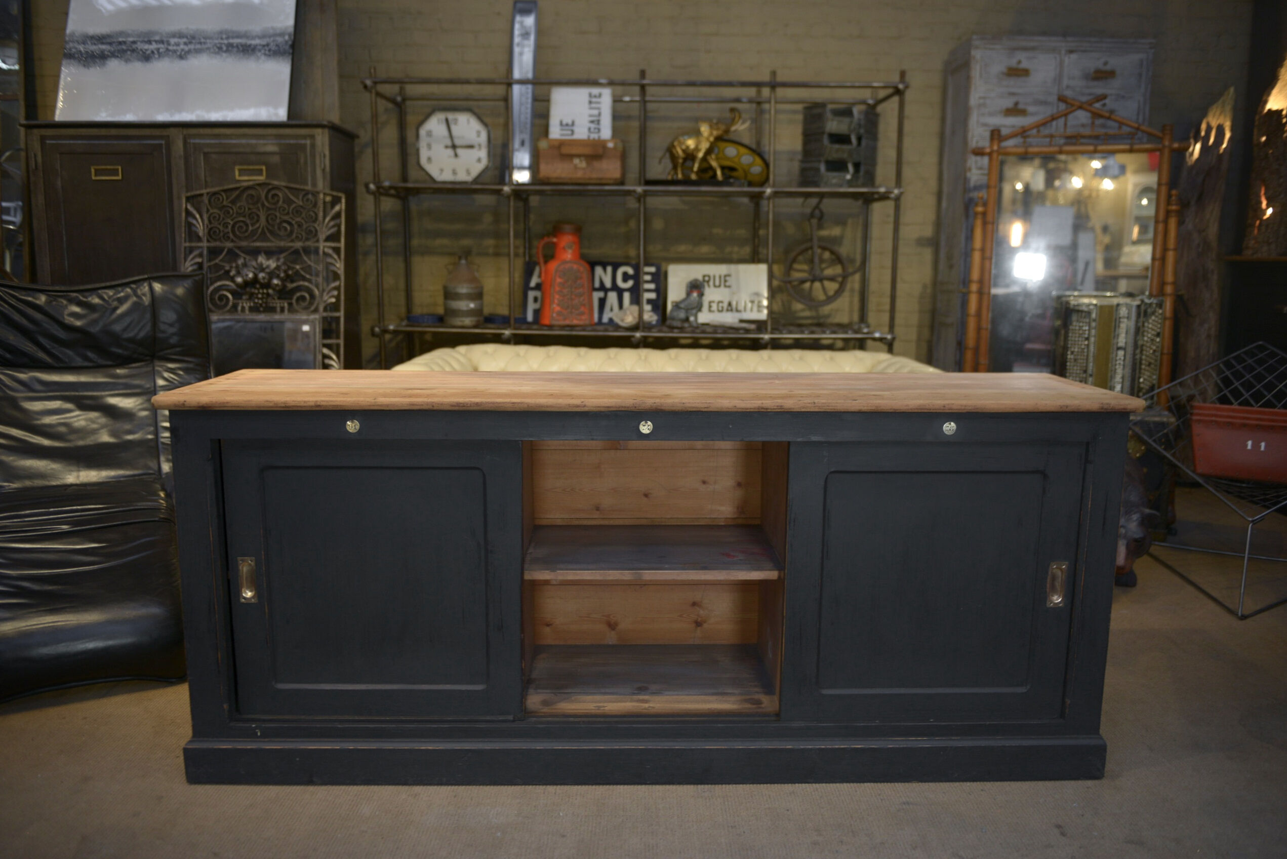 Low cabinet with sliding doors in fir 1930