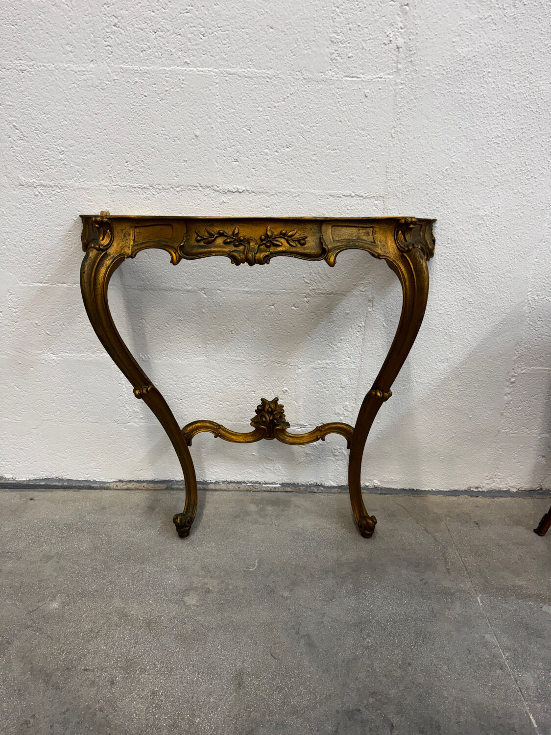 Carved gilded wooden console and marble in Louis XV style