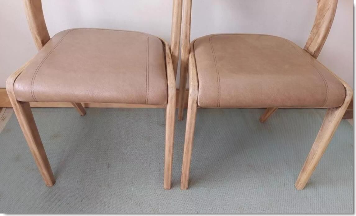 Pair of Baumann leather gondola chairs