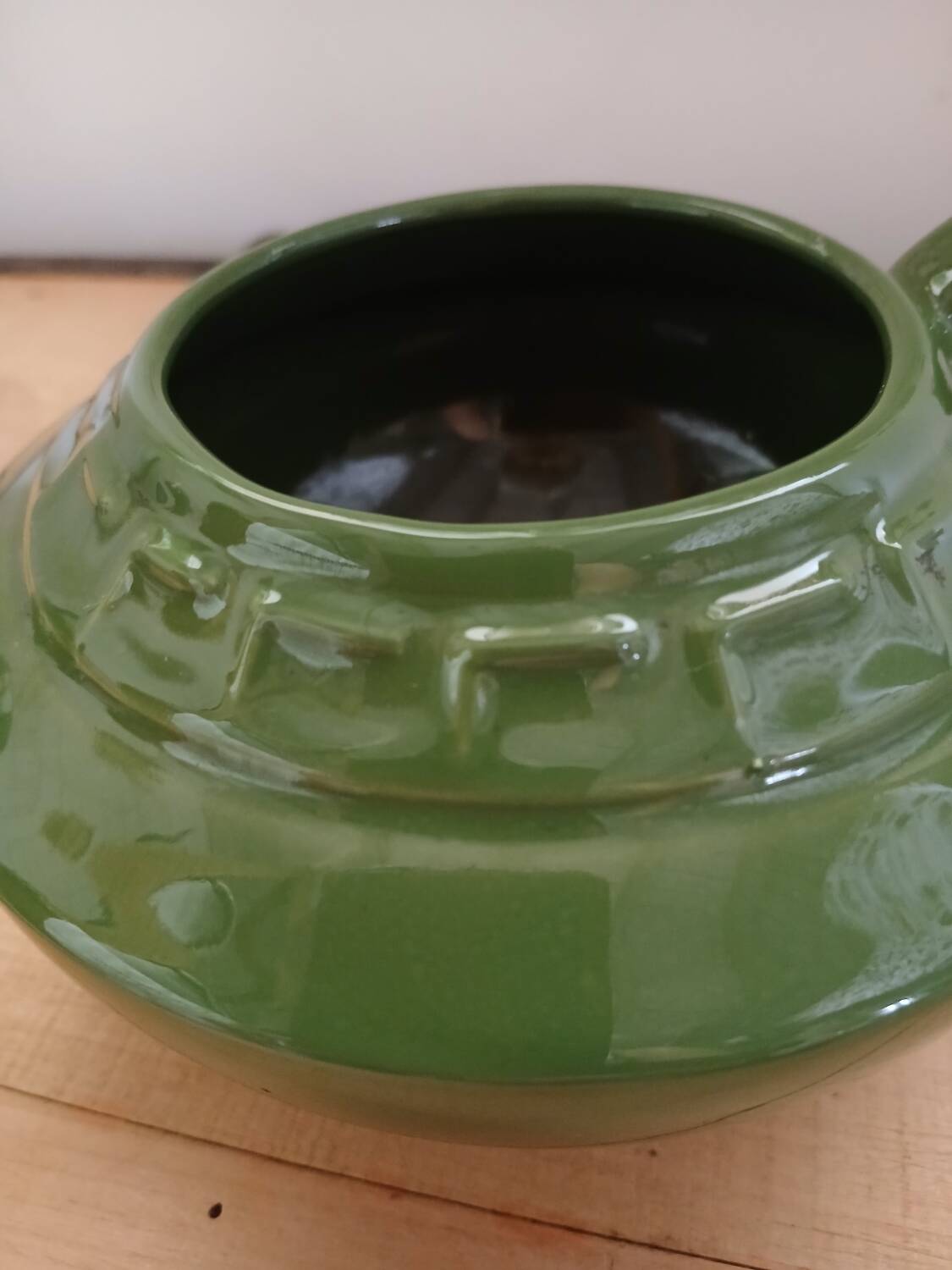Green earthenware teapot