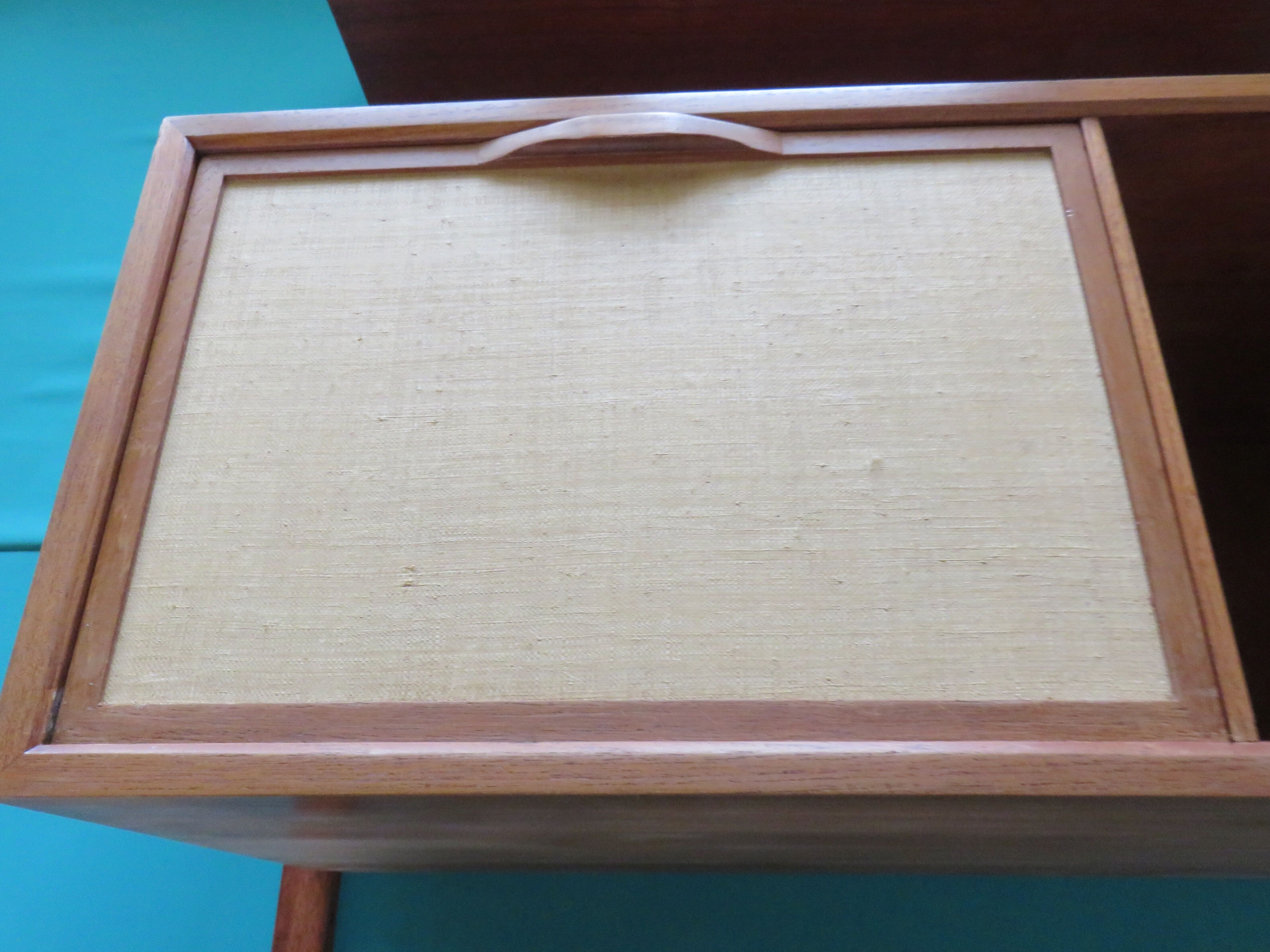 Wall shelving system and teak writing box. of Poul Cadovius. Denmark 1960